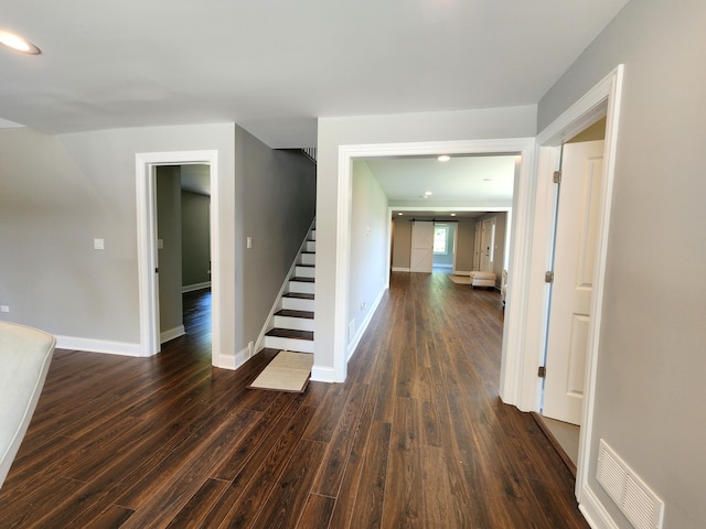 hallway featuring hardwood / wood-style flooring