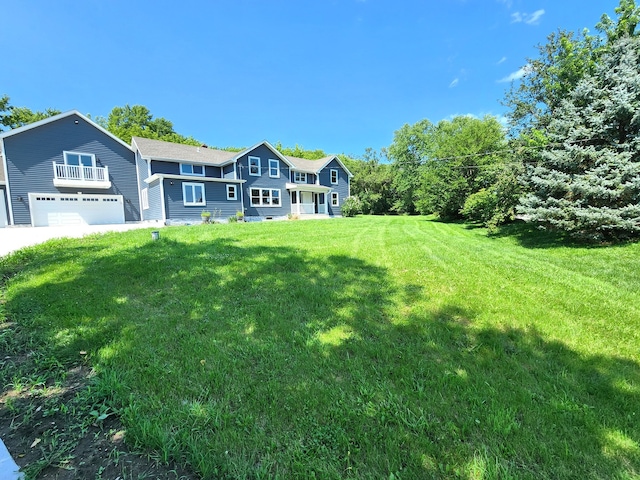 view of yard with a garage