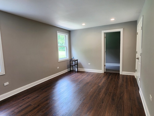 unfurnished room featuring wood-type flooring