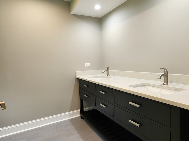 bathroom with dual vanity