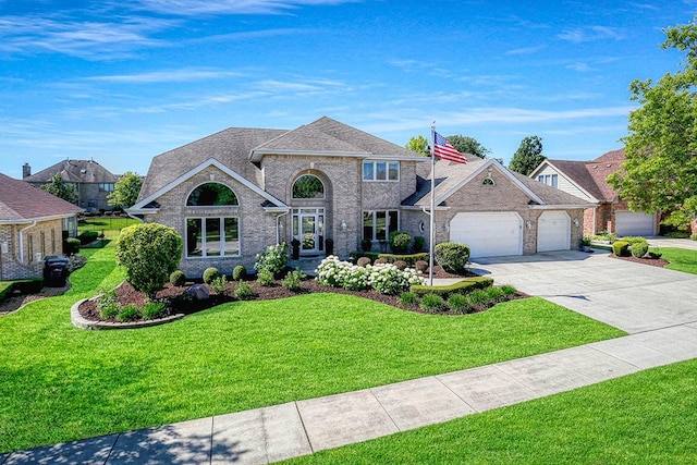 view of front of home with a garage, a shingled roof, brick siding, concrete driveway, and a front lawn