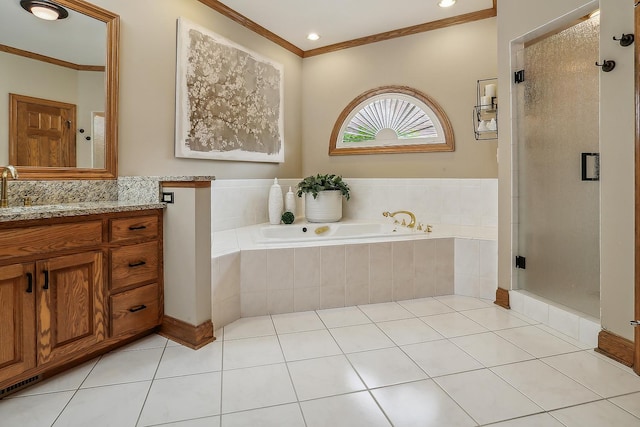 bathroom featuring a garden tub, crown molding, a stall shower, vanity, and tile patterned flooring