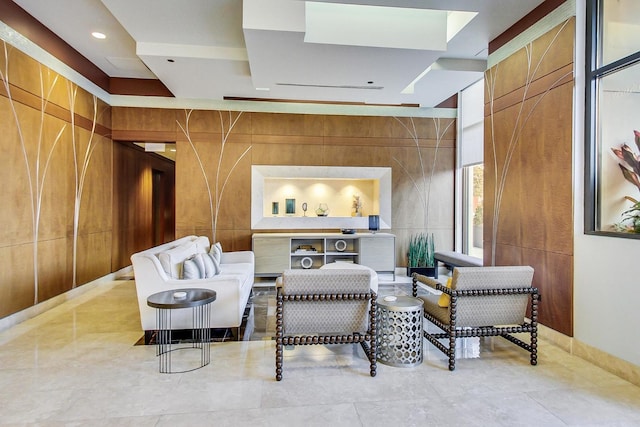 interior space with tile patterned floors and wooden walls