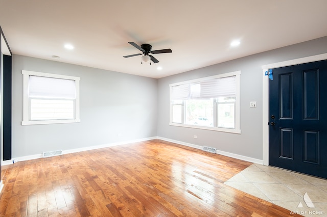 entrance foyer featuring light hardwood / wood-style floors and ceiling fan