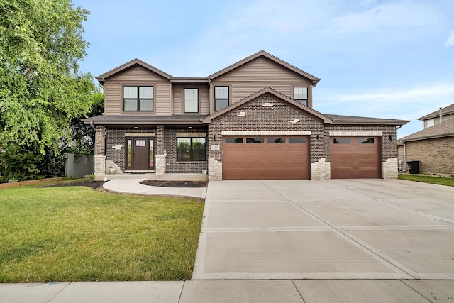 view of front of property with a garage, driveway, brick siding, and a front yard