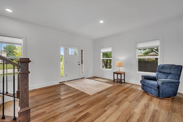 entrance foyer with light wood-type flooring