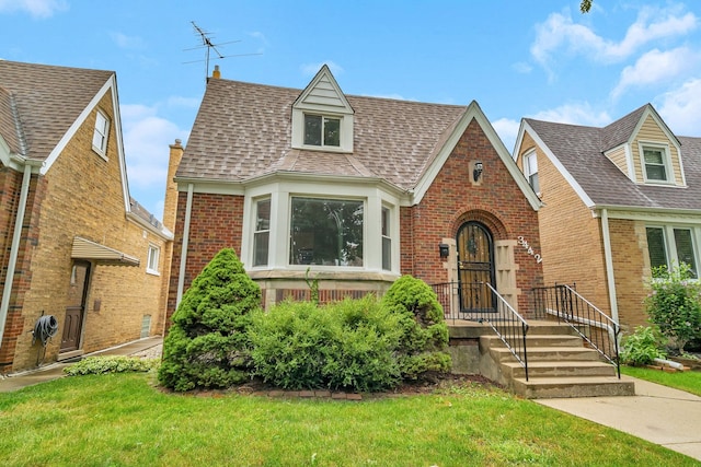 view of front of home with a front yard