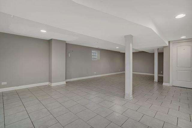 basement featuring light tile patterned floors