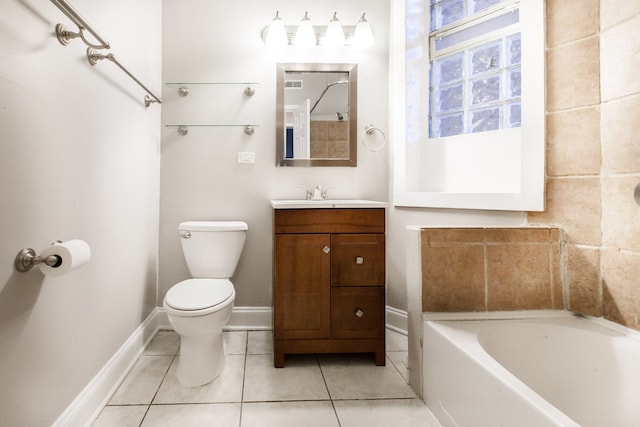 bathroom with toilet, tile patterned floors, and vanity