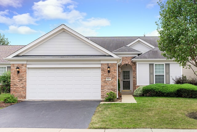 single story home with a garage and a front yard