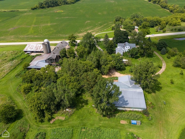 birds eye view of property with a rural view