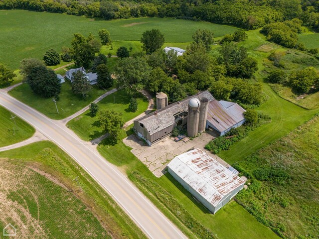 birds eye view of property featuring a rural view