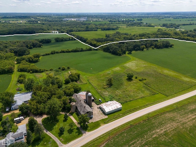 birds eye view of property featuring a rural view