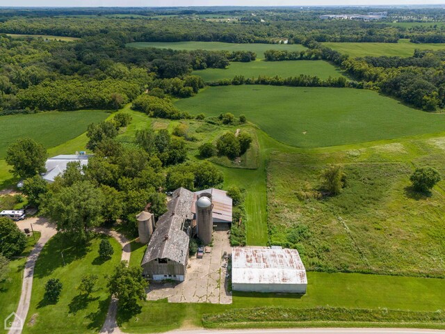 birds eye view of property featuring a rural view