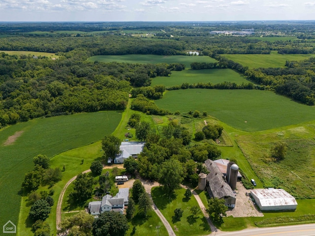 birds eye view of property with a rural view