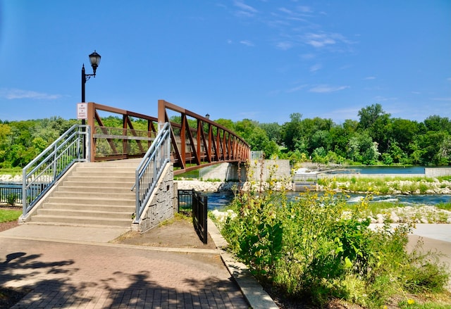 surrounding community with a water view