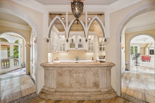 full bathroom with a bath and ornamental molding