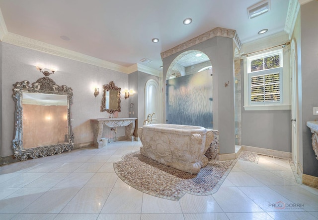 full bathroom featuring tile patterned floors, a stall shower, ornamental molding, baseboards, and a bathtub