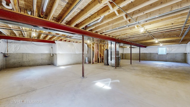 basement featuring water heater