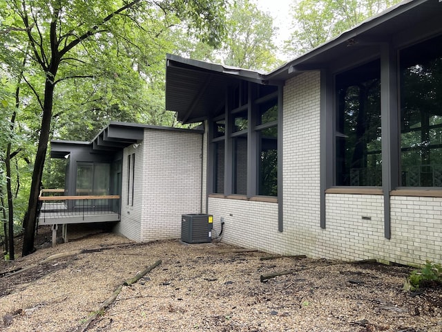 view of home's exterior featuring central AC unit