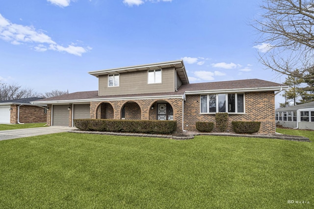 view of front of home featuring a garage and a front yard