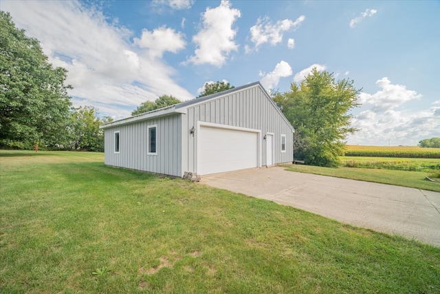 garage with a yard