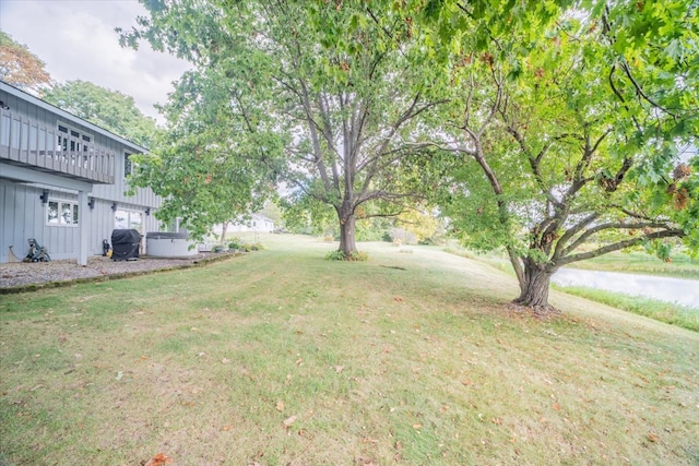 view of yard with a water view