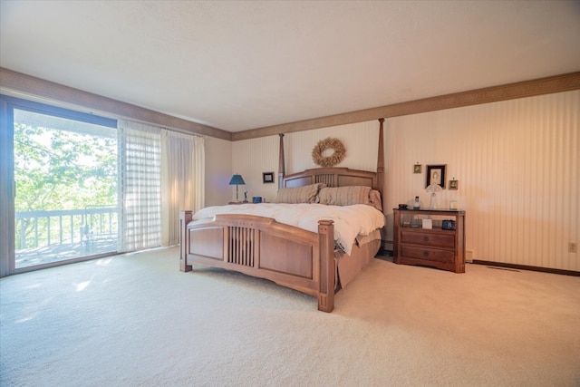 bedroom featuring carpet floors and access to outside