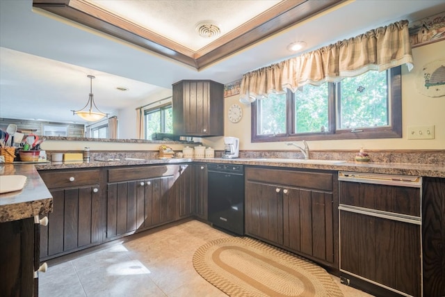 kitchen featuring dark brown cabinets, pendant lighting, black dishwasher, and sink