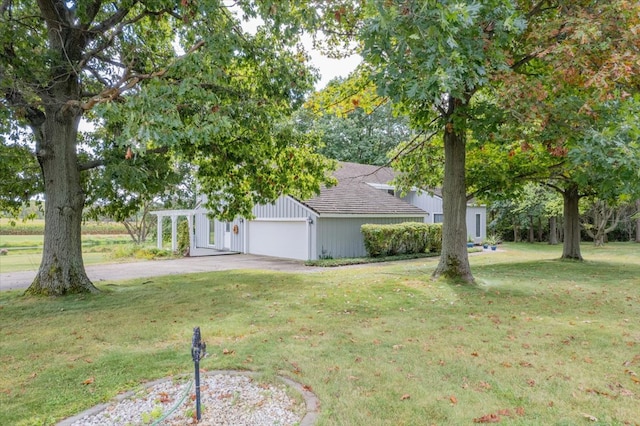 view of yard featuring a garage