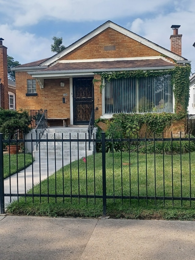 exterior space with a front lawn