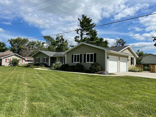 ranch-style home with a garage and a front yard