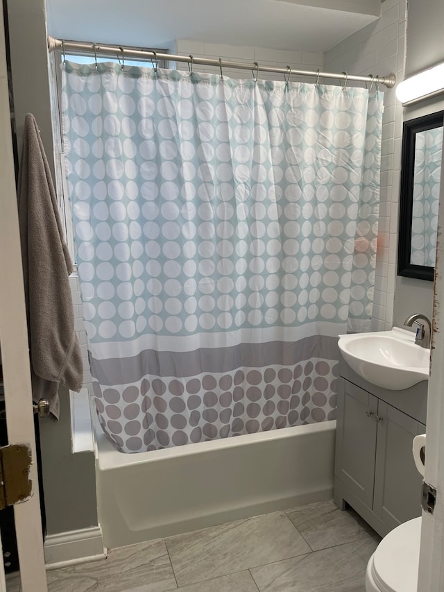 full bathroom with vanity, toilet, and shower / bath combination with curtain