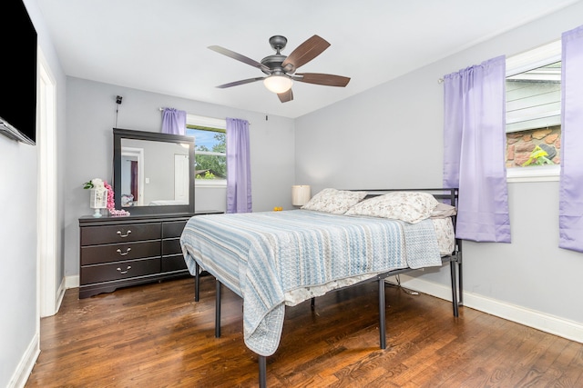 bedroom with ceiling fan and hardwood / wood-style floors