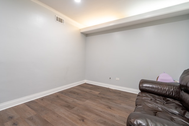 unfurnished room featuring dark hardwood / wood-style flooring