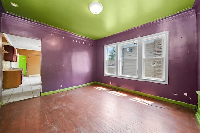 empty room with wood-type flooring