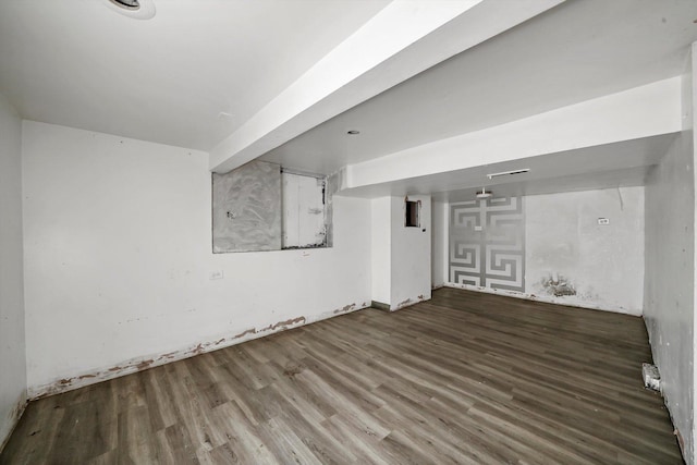 basement featuring wood-type flooring