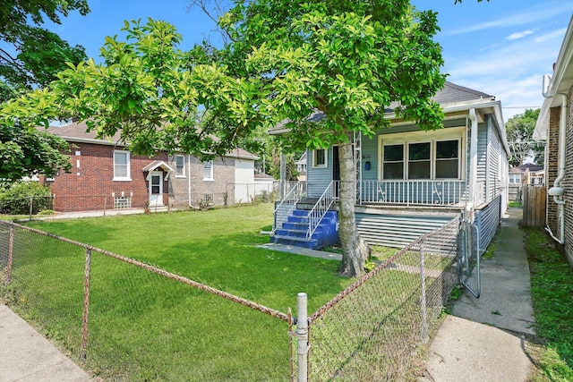 view of front of house with a front lawn and a porch