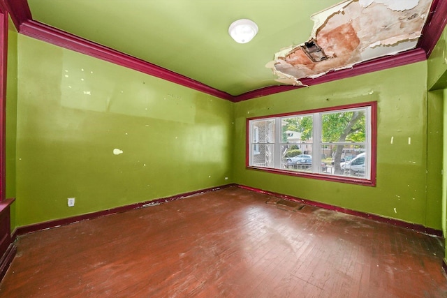 spare room featuring dark wood-type flooring