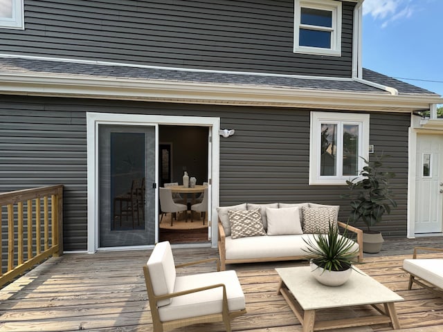 deck with an outdoor hangout area