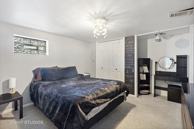 bedroom featuring light carpet