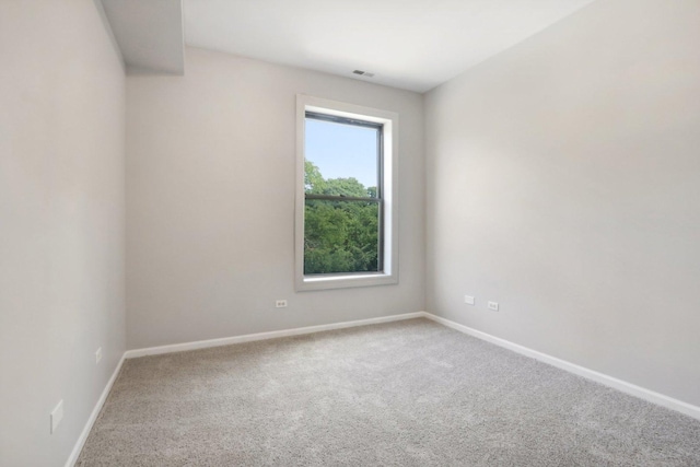 view of carpeted spare room