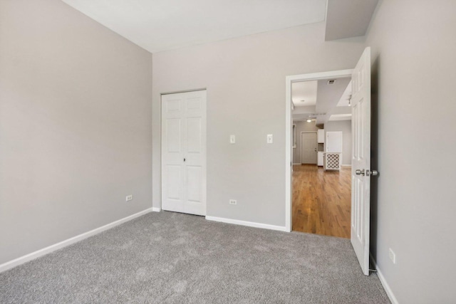 unfurnished bedroom with carpet floors