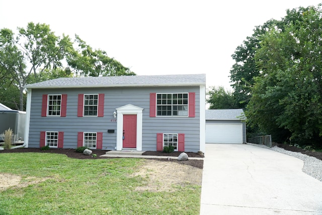 raised ranch with a front yard