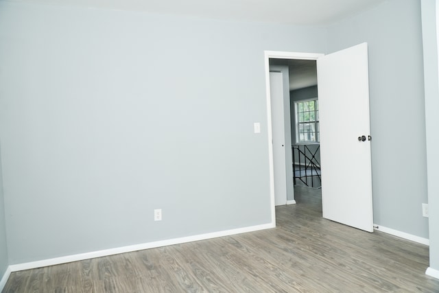 spare room with light wood-type flooring