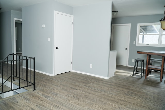 empty room featuring dark hardwood / wood-style flooring