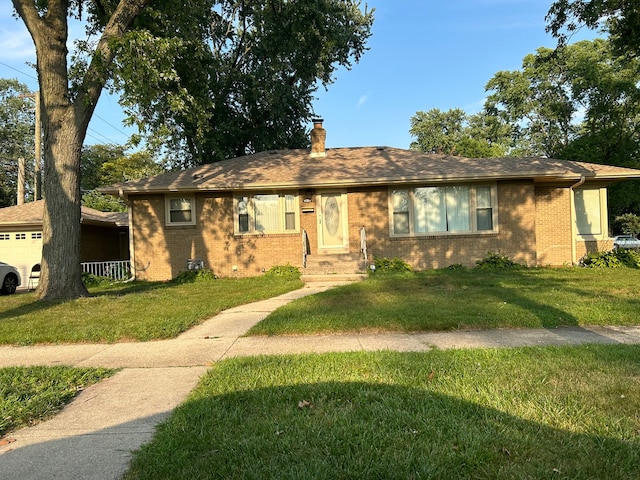 ranch-style house with a front lawn