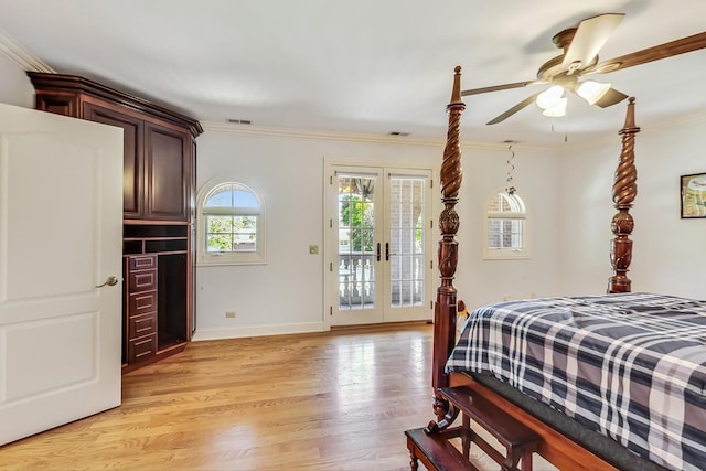 bedroom with light hardwood / wood-style floors, crown molding, access to exterior, and ceiling fan