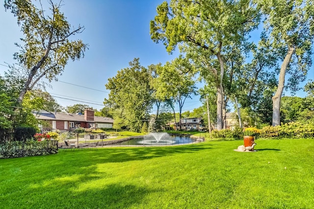 view of yard featuring a water view