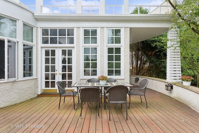 sunroom featuring french doors